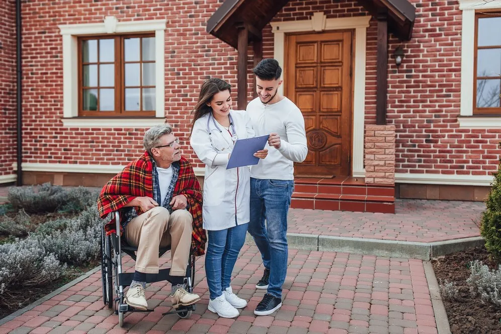 Disability support coordinator guiding NDIS participant with care planning